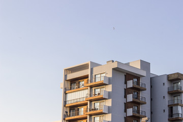 Perspective shot of reinforced concrete mass housing at summertime in Izmir at Turkey
