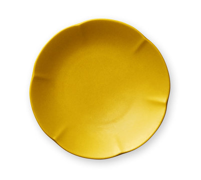 Empty yellow plate with wavy edge, Frilled Plate, View from above isolated on white background with clipping path