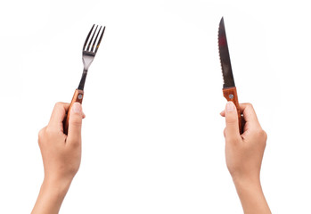 hand holding knife and fork isolated on white background