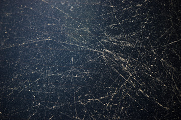 Lines with dush on black glass