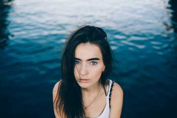 Portrait of cute girl with long dark hair