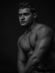 Fototapeta na wymiar Portrait of a young caucasian male athlete
