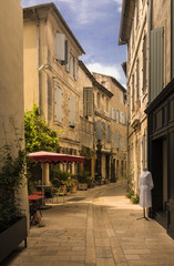 Street in historic city center of St Remy de Provence. Buches du Rhone, Provence, France.