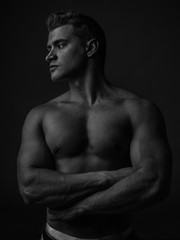 Fototapeta na wymiar Portrait of a young caucasian male athlete