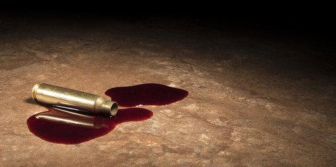 Assault rifle brass with blood on the floor