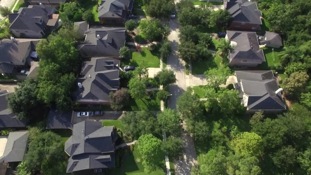 This video is of an aerial view of homes in affluent neighborhood in Houston, Texas. This video was filmed in 4k for best image quality.