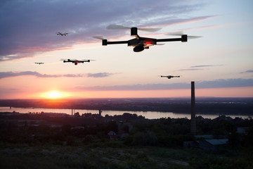 group of drones above the city