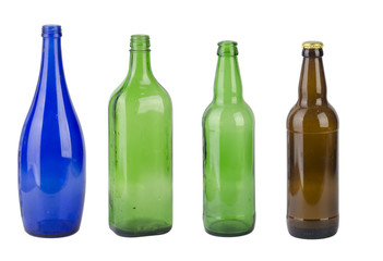 group of colored glass bottles isolated on white background