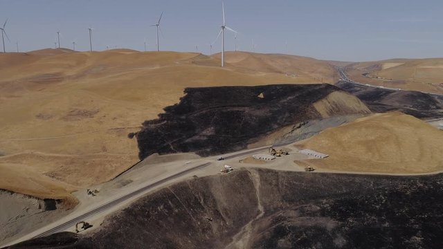 Aerial footage of a 650 acre fire started in the Altamont hills between Tracy and Livermore in California.