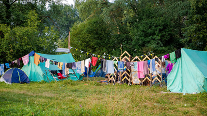 A camp in the woods, outdoor recreation, a tent town