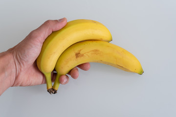 Banane in der Hand halten