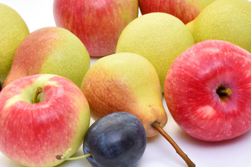 Pears and apples apples on a white background.