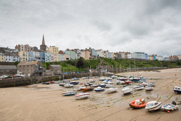 Fototapeta na wymiar The harbour and old town of Tenby, captured at low tide