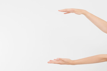 female hands measuring invisible items, woman's palm making gesture while showing small amount of...