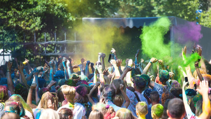 happy colorful people at the Holi Colors Festival