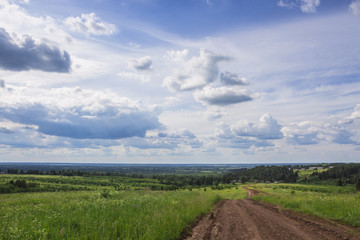 View from the hill, the road leading to the village