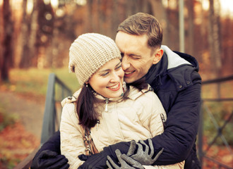 Fototapeta premium girl with guy in autumn park