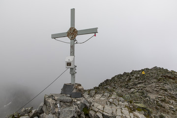 summit cross on great boesenstein in the low tauern, styria austria
