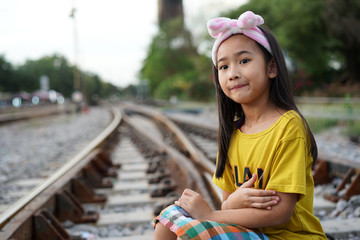 Portrait Asian cute little girl Railway background