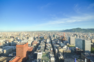 Fototapeta na wymiar Sapporo Panorama Cityscape from JR Tower Observation Deck T38,Sapporo, Northern Japan.