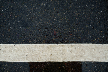 Fototapeta premium Stripes on the road in the rainy season