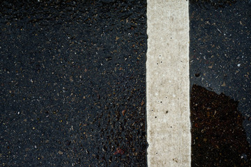 Fototapeta premium Stripes on the road in the rainy season