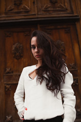 Fototapeta premium Brunette near the Church