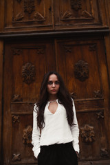 Fototapeta premium Brunette near the Church