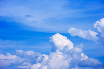 Cumulus clouds in the blue summer sky
