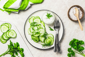 Vegetarian low calorie cucumber and fennel salad with yogurt dressing. Top view, space for text.