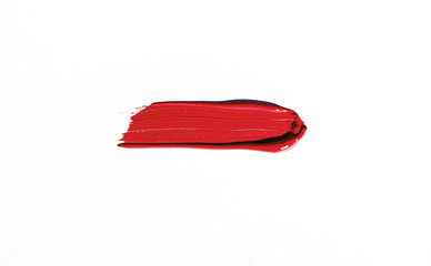 Red brush stroke isolated over white background