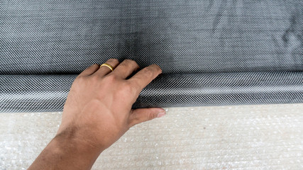 Black carbon fiber composite holder by hand