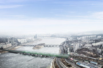 Seoul cityscape, skyline, high rise office buildings in Seoul city, winter daylight Crack on an ice...