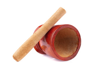 Wooden mortar with pestle isolated on white background
