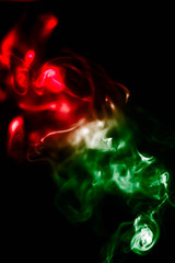 Abstract smoke isolated on black background. (Red and Green colors) No. 4