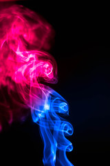 Obraz premium Abstract smoke isolated on black background. (Red and Blue colors. No.4)