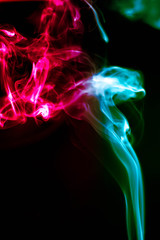 Obraz premium Abstract smoke isolated on black background. (Red and Green colors) No. 6