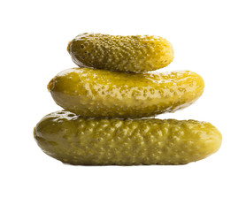 Group of marinated pickled cucumber isolated on white.