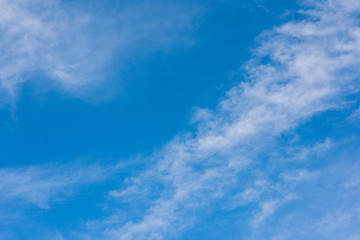 Obraz premium Beautiful blue sky with scattered clouds - religious puritiy scene view from below to the space and future