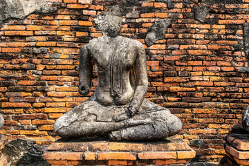 Headless Buddha's statue at Wat Chaiwatthanaram, which is the ancient Buddhist temple in Ayutthaya province, Thailand. 