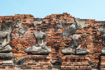 Headless Buddha's statues at Wat Chaiwatthanaram, which is the ancient Buddhist temple in Ayutthaya province, Thailand. 