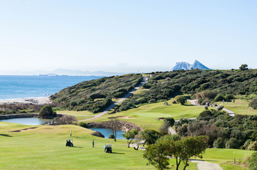 Beach and golf field in La Alcaidesa, Costa del Sol, Spain © chgvisual