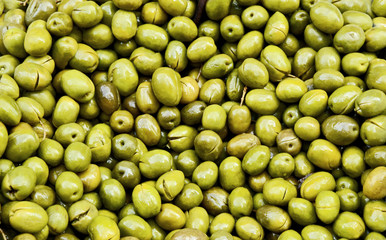 A lot of pitted Green Olives for sell at Central  market in Athens Greece with full frame.