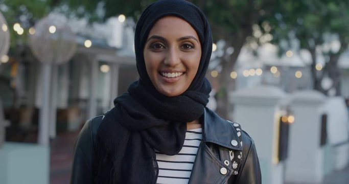 portrait beautiful young muslim woman smiling enjoying successful urban lifestyle confident ethnic female wearing hijab in city