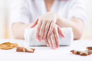 Woman in spa with her manicure done