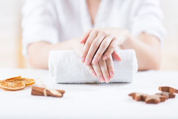 Woman in spa with manicure done