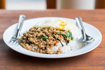 Rice topped with stir-fried pork basil and Fried egg 
