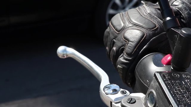 Throttle On Motorcycle With Leather Gloves