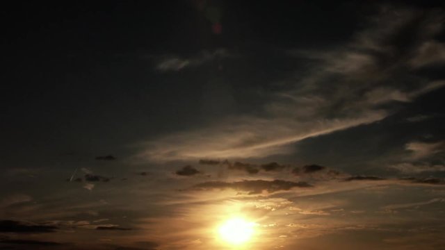 Timelapse of cirrus clouds during sunset
