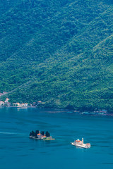 Famous Gospa-od-Shkrpjela from a bird's-eye view of the Boko-Kotor Bay in Montenegro